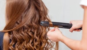 steps to curl your hair with a straightener